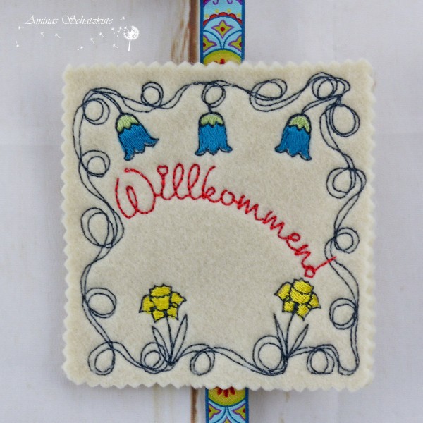 Springtimes Stickdatei für Türschilder 10x10